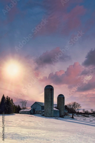 Fototapeta Rural winter scenes of large open fields and sky with barns, farmland and the setting sun.  Ice and cascades.  