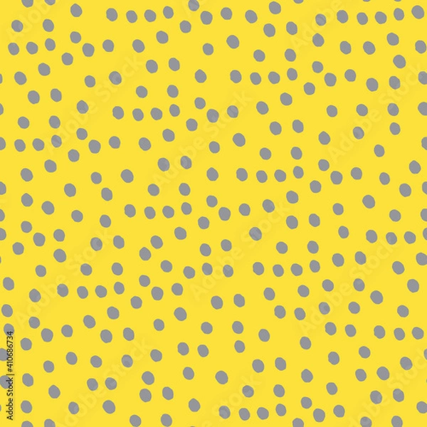Fototapeta Seamless repeating spotted pattern with tiny hand drawn dots. Yellow vector background for surface design and other design projects