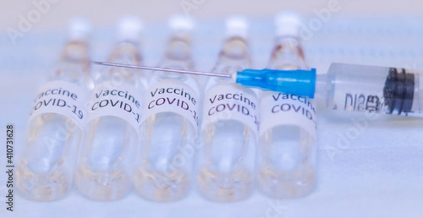 Obraz coronavirus vaccine. sars-cov-2 COVID-19. Some ampoules with ncov-2019 vaccine