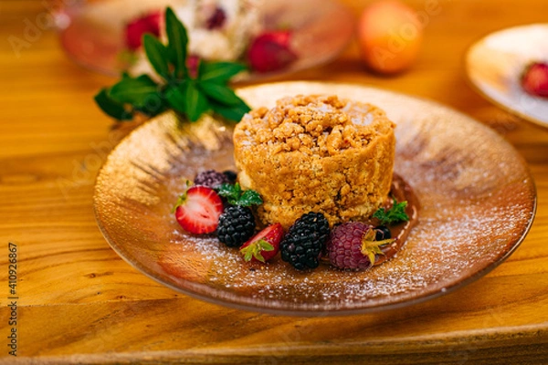 Fototapeta dessert with berries on a decorated table