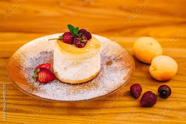 Fototapeta dessert with berries on a decorated table