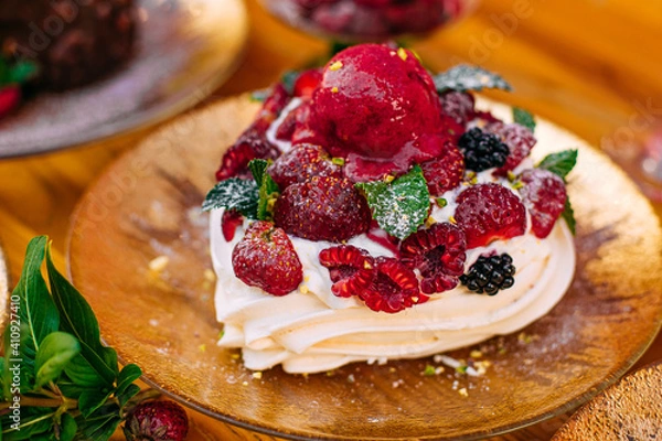Fototapeta dessert with berries on a decorated table