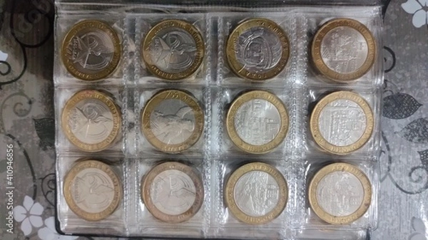 Fototapeta coins in a row