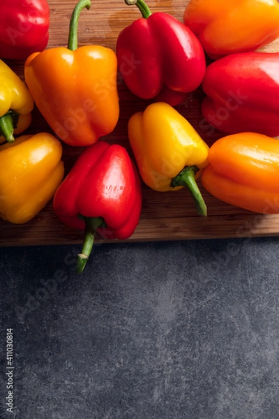 Obraz Fresh vegetables, colorful orange, red and yellow bell peppers