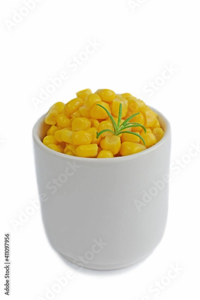Obraz Canned corn in a white dish on a white background.