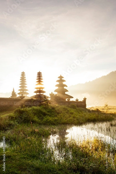 Fototapeta Morning view at Tamblingan Lake, Singaraja Bali. this lake part of twin lake in north of Bali. here have a Hindu Temple. this place very beautiful when you come in sunrise time