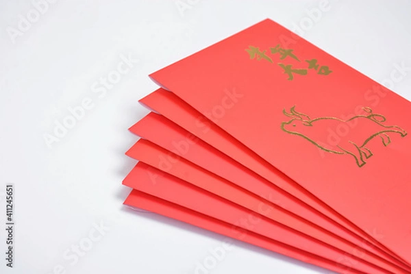 Fototapeta Chinese New Year 2021 red ang pao on white background. Translation Chinese - Wishing you luck in this year of the ox