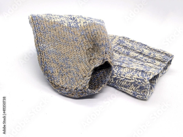 Obraz leaky woolen sock. one holey woolen sock on a white background side view