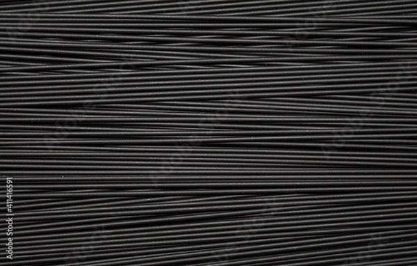 Obraz Black spaghetti background. Spaghetti squid ink "romagnola" style.