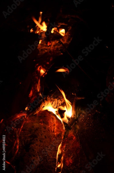 Fototapeta OrBonfire similar to the face of a fiery deitythodox cathedral against a bright blue sky