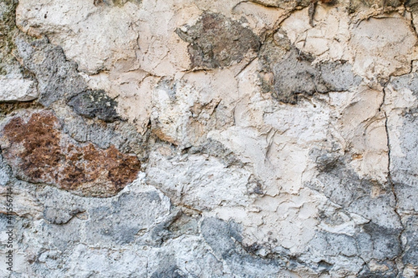 Obraz concrete wall with large embedded stones