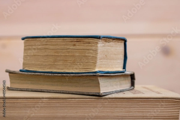 Fototapeta Old books. A stack of books. Book pages. Close-up