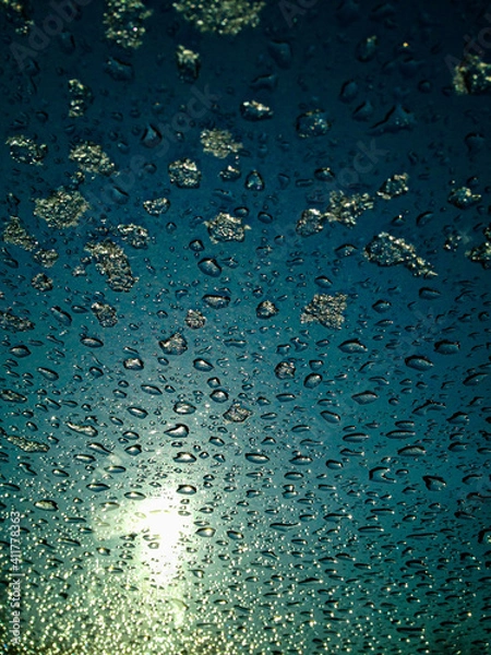 Obraz frosty natural pattern on winter window, drops and sun 