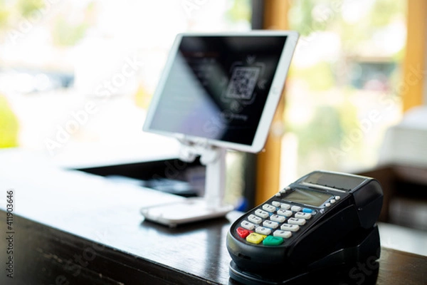 Fototapeta Customer using smartphone for making wireless to payment.