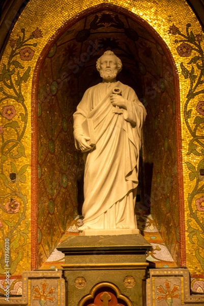 Fototapeta Lourdes, France, June 24, 2019: One of the statues in the Basilica of the Immaculate Conception in Lourdes,