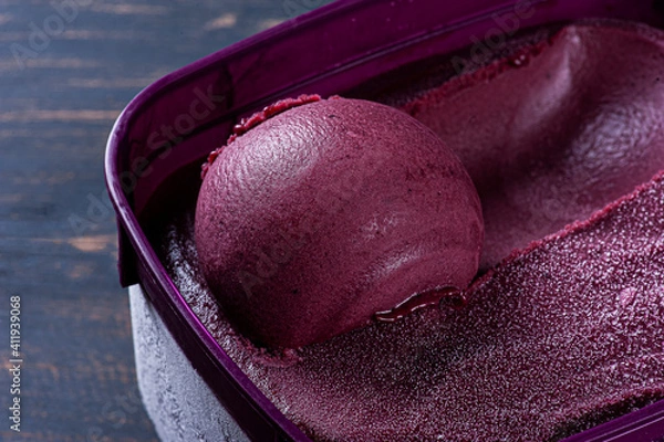 Fototapeta .Close-up of frozen Brazilian açaí in a purple box. Top view