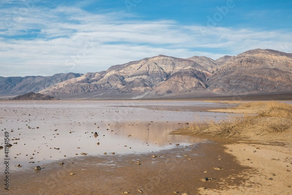 Fototapeta Flooded desert floor after winter rain in Death Valley, California