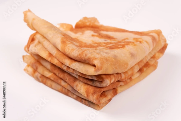 Obraz a stack of pancakes folded in a triangle