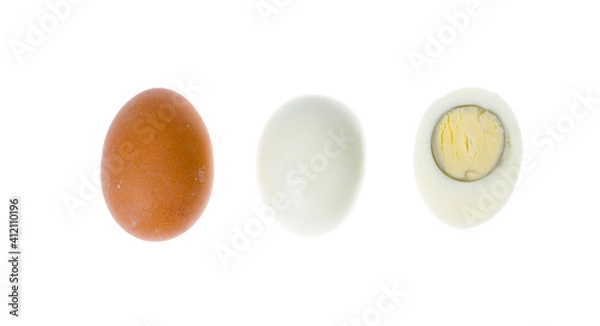 Fototapeta Boiled chicken eggs with colored shells on white background.