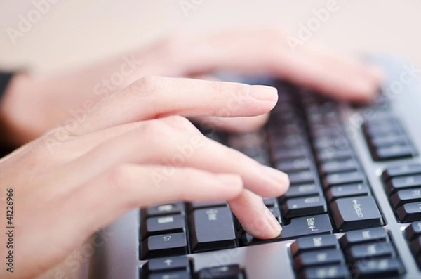 Obraz Hands typing on the keyboard