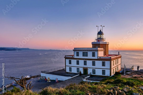 Fototapeta Sunset in the Lighthouse of the Finisterre cape, Costa de la Muerte, Galicia. Northern Spain. One of the last stages in the jacobian way.