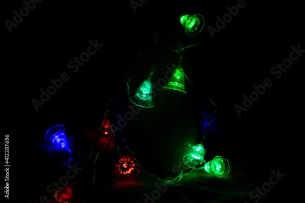 Obraz Multicolored bright lanterns on a dark background