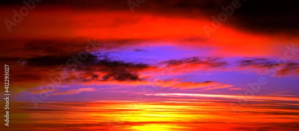 Fototapeta beautiful landscape with sky, clouds and sunrise a panoramic view. panorama sunset. scenery romantic cloudscape