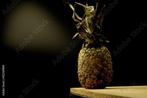 Obraz Pineapple over atable