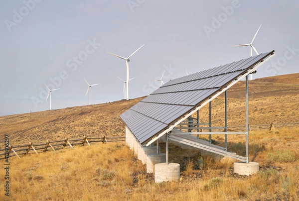 Obraz Wind Turbines and Solar Panel. Wind turbines and solar panels on an arrid field of grass in Washington State.

