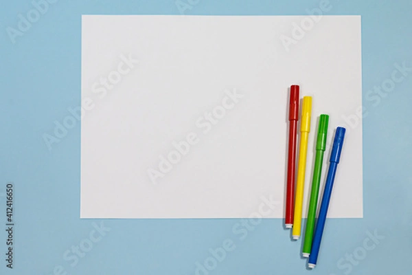 Fototapeta Copyspace blank of white paper covered with multiple colorful felt pen markers