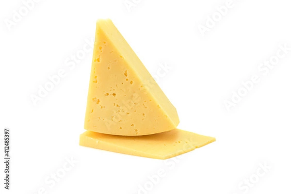 Fototapeta Solid yellow gouda cheese, close-up, isolated on a white background.selective focus.
