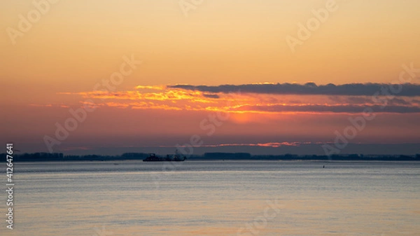 Fototapeta sunset over the river