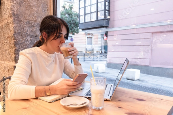 Obraz Woman drinking a coffee