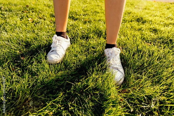 Obraz Detail of the feet on the grass