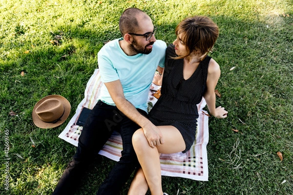 Obraz Photo of a couple looking at each other
