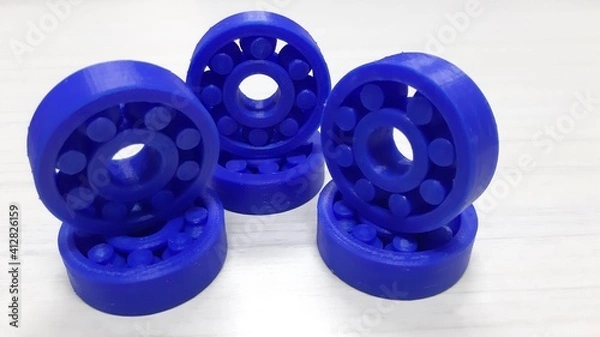 Fototapeta a collection of plastic bearings made using a three-dimensional printer