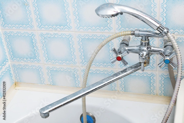 Fototapeta Dirty calcified shower mixer tap, faucet with limescale on it, close up