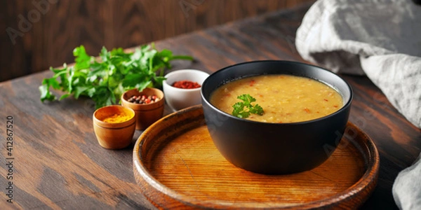 Fototapeta Lentil soup (Masoor Dal or Dal Tadka Curry). Indian national dish. Top view.