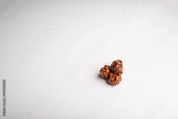 Fototapeta Popcorn with chocolate flavor isolated on white background