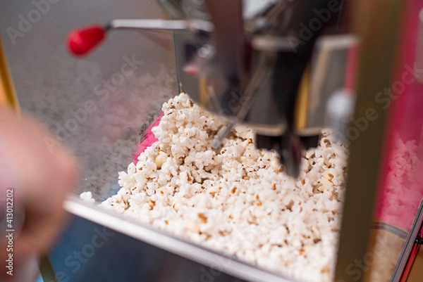 Fototapeta Popcorn in a popcorn machine