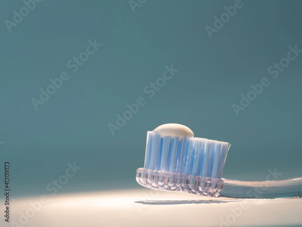 Fototapeta toothbrush with the right amount of toothpaste. concept of proper dental hygiene, dental care