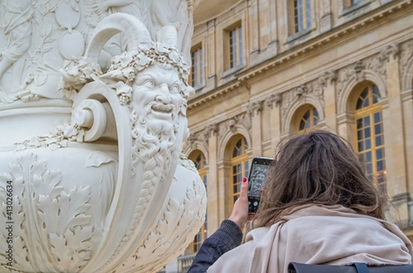 Obraz Taking a photo of a sculpture in the Gardens of the Palace of Versailles - historical, royal.