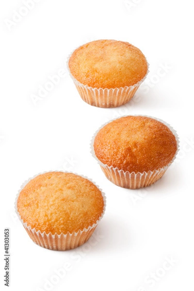 Obraz Three mini cupcakes in paper bakeware