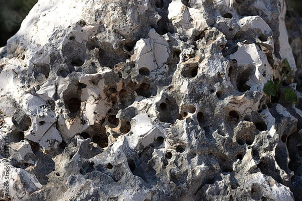 Obraz a large stone that split from a marble rock