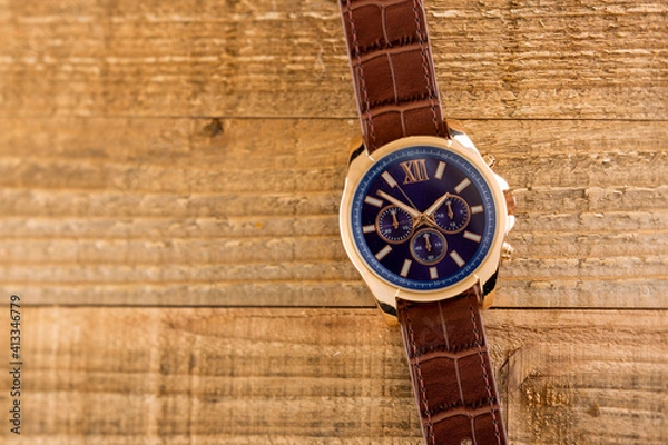 Obraz Watch with wood texture background