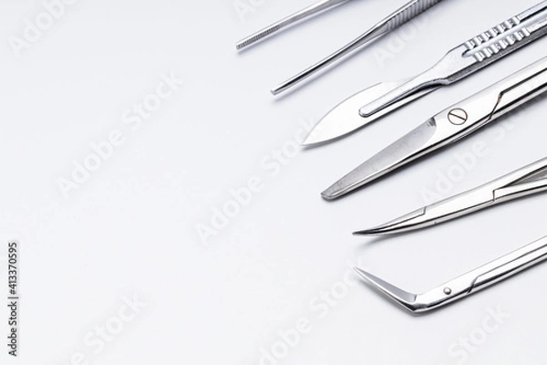 Fototapeta surgery instruments collection on white background. medical tools frame. surgeon concept