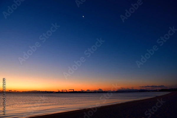 Fototapeta 阿漕浦海岸からの日の出