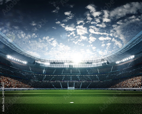 Fototapeta Empty soccer stadium in the evening light