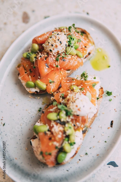 Fototapeta vegetables and salmon on bread