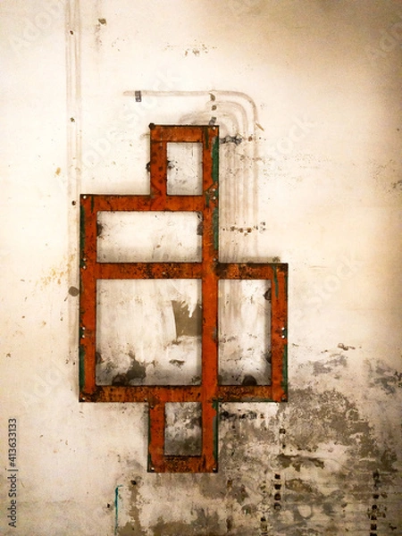 Fototapeta Red iron rectangles in old electrical installation